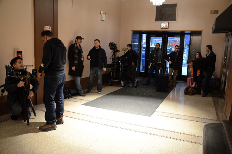 Stay at Home crew in the hotel lobby